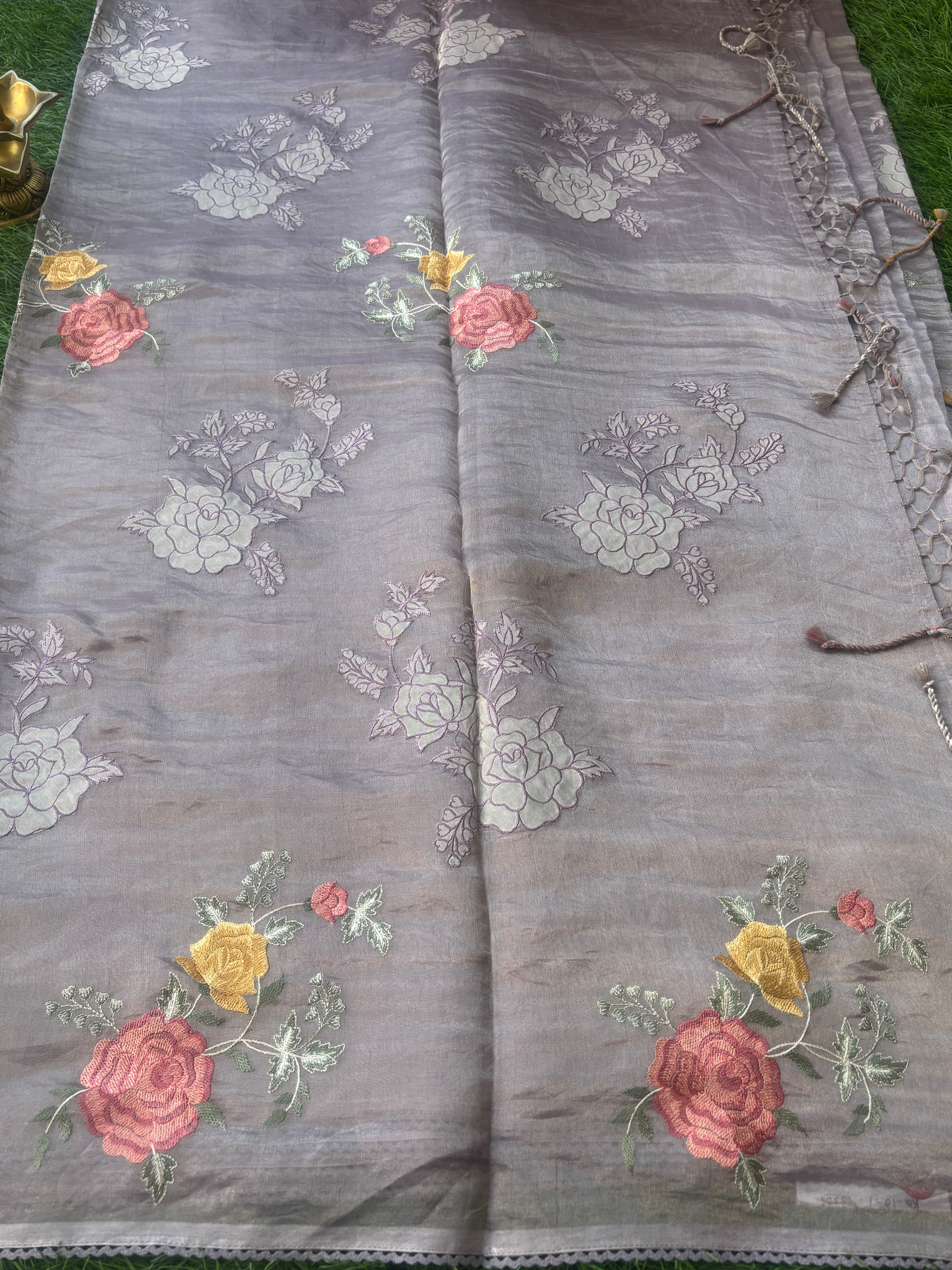 Luxury pastel purple organza saree with crochet border and floral embroidery