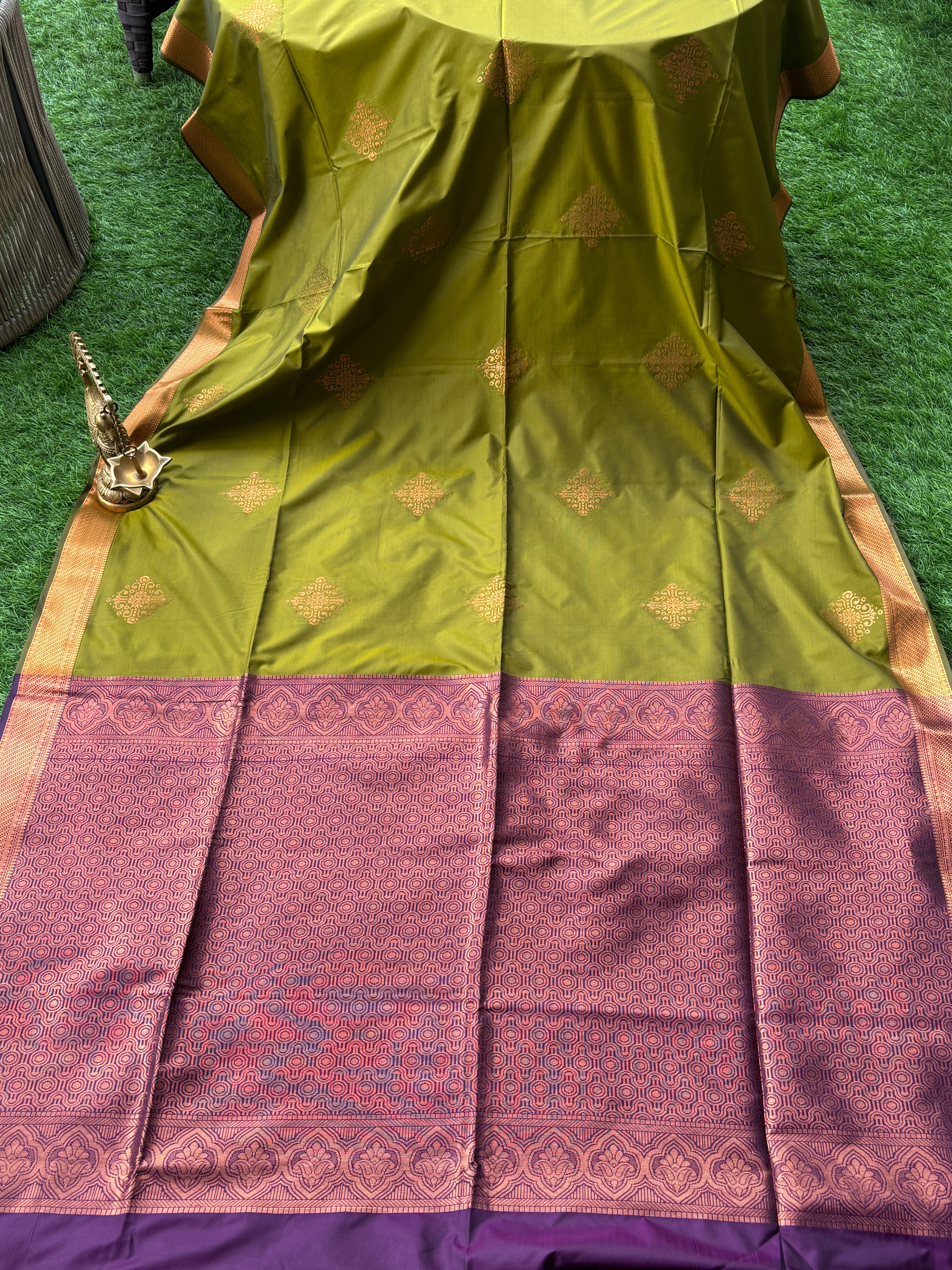Royal Green Art Silk Kanjeevaram Saree with All-Over Zari Buttas & Purple Pallu