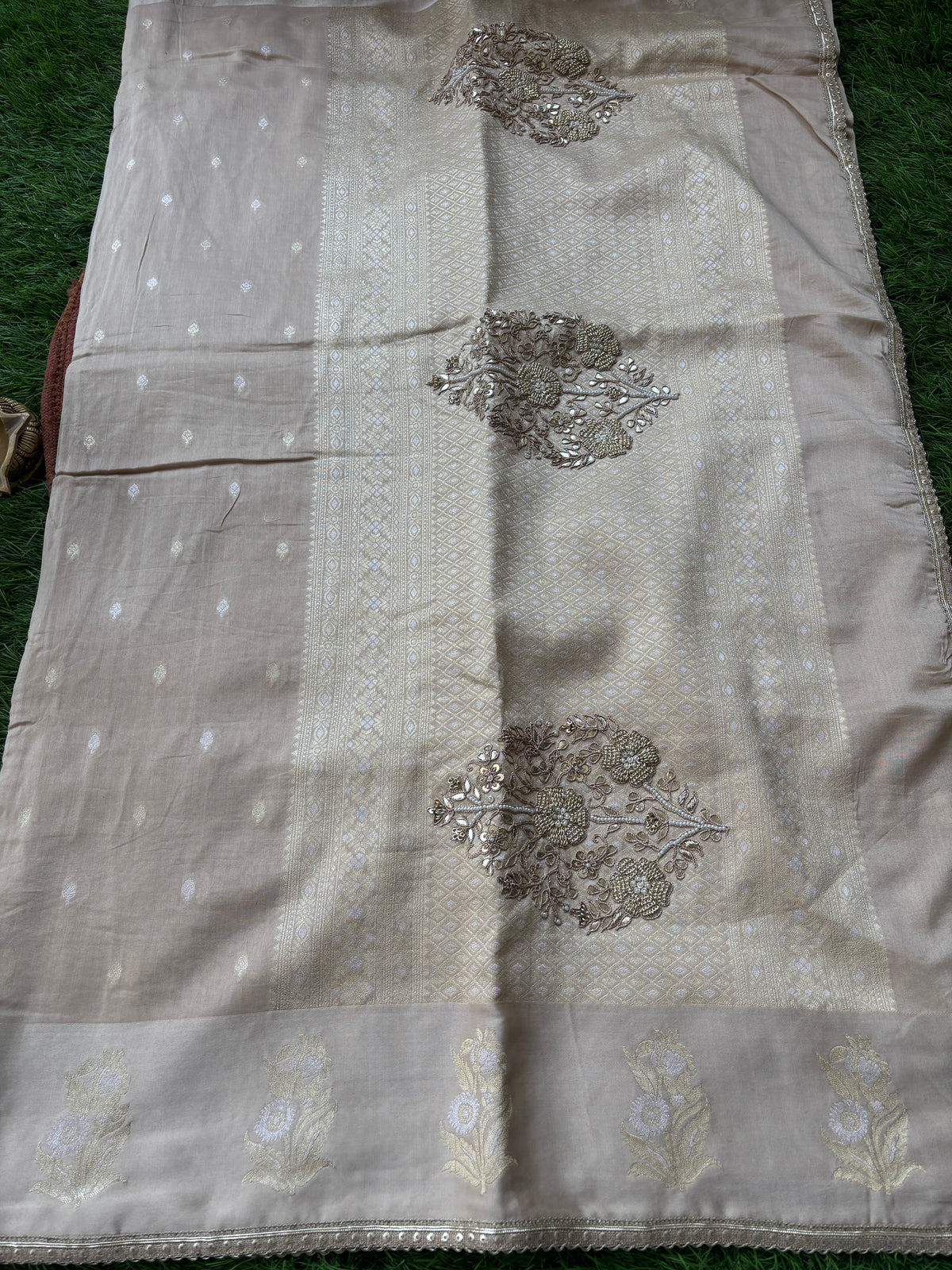 Banarasi weaving offwhite sari with embroidery Zardozi Buta on Pallu all over weaving on the sari and with ready-made blouse