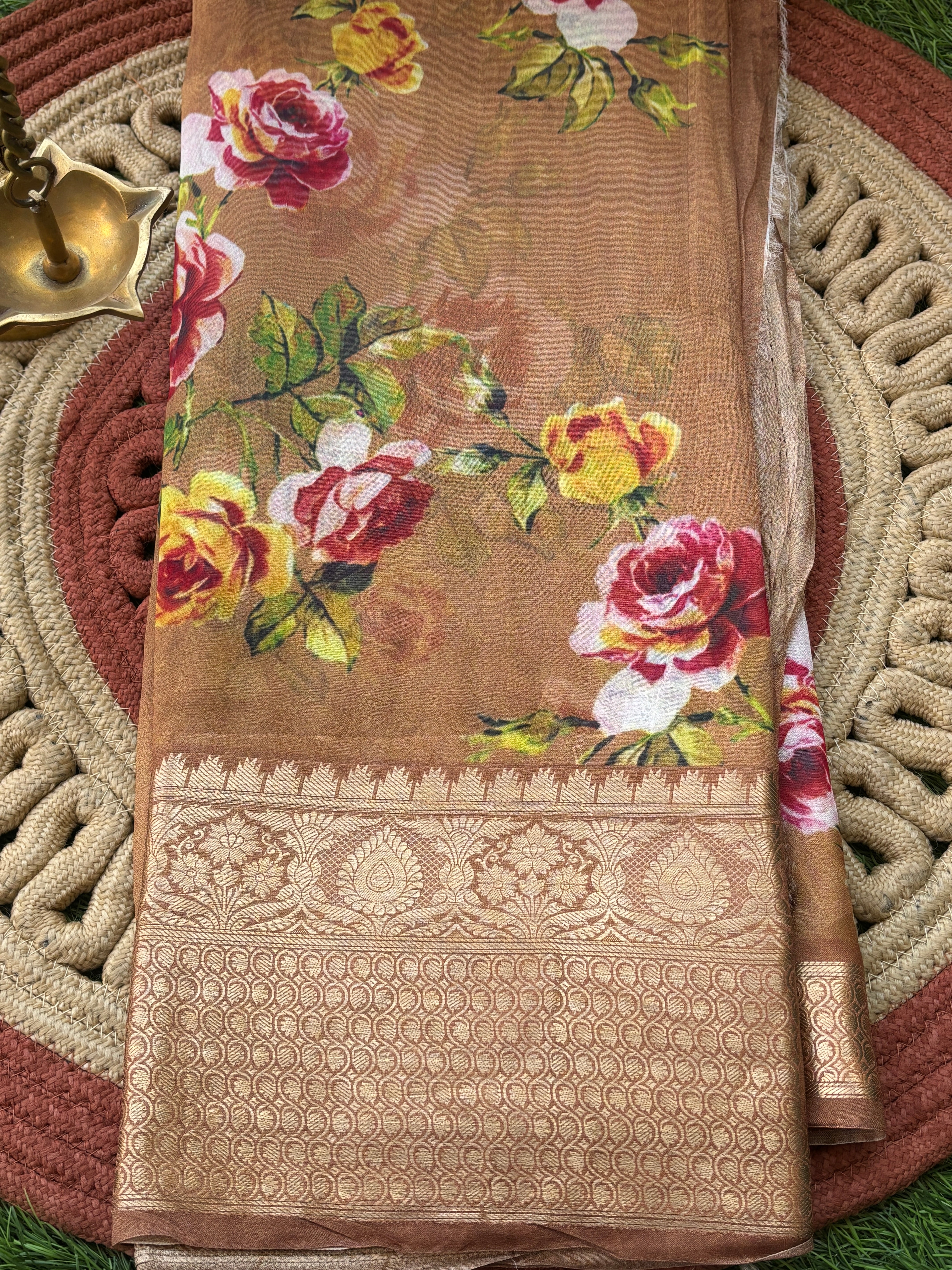 Elegant Brown Georgette Saree with Zari Woven Border