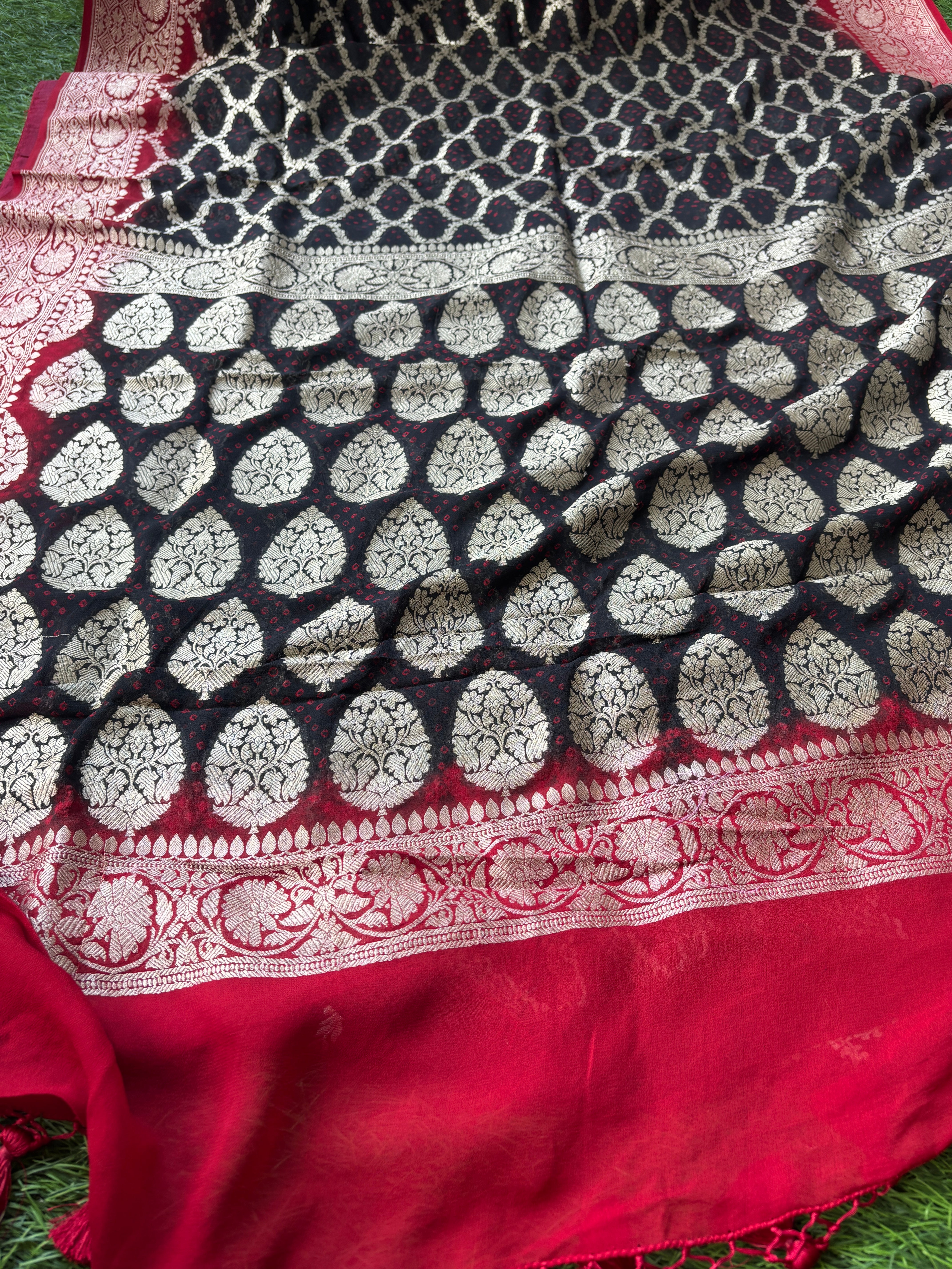 Rich maroon pallu with intricate golden zari weaving on Banarasi saree
