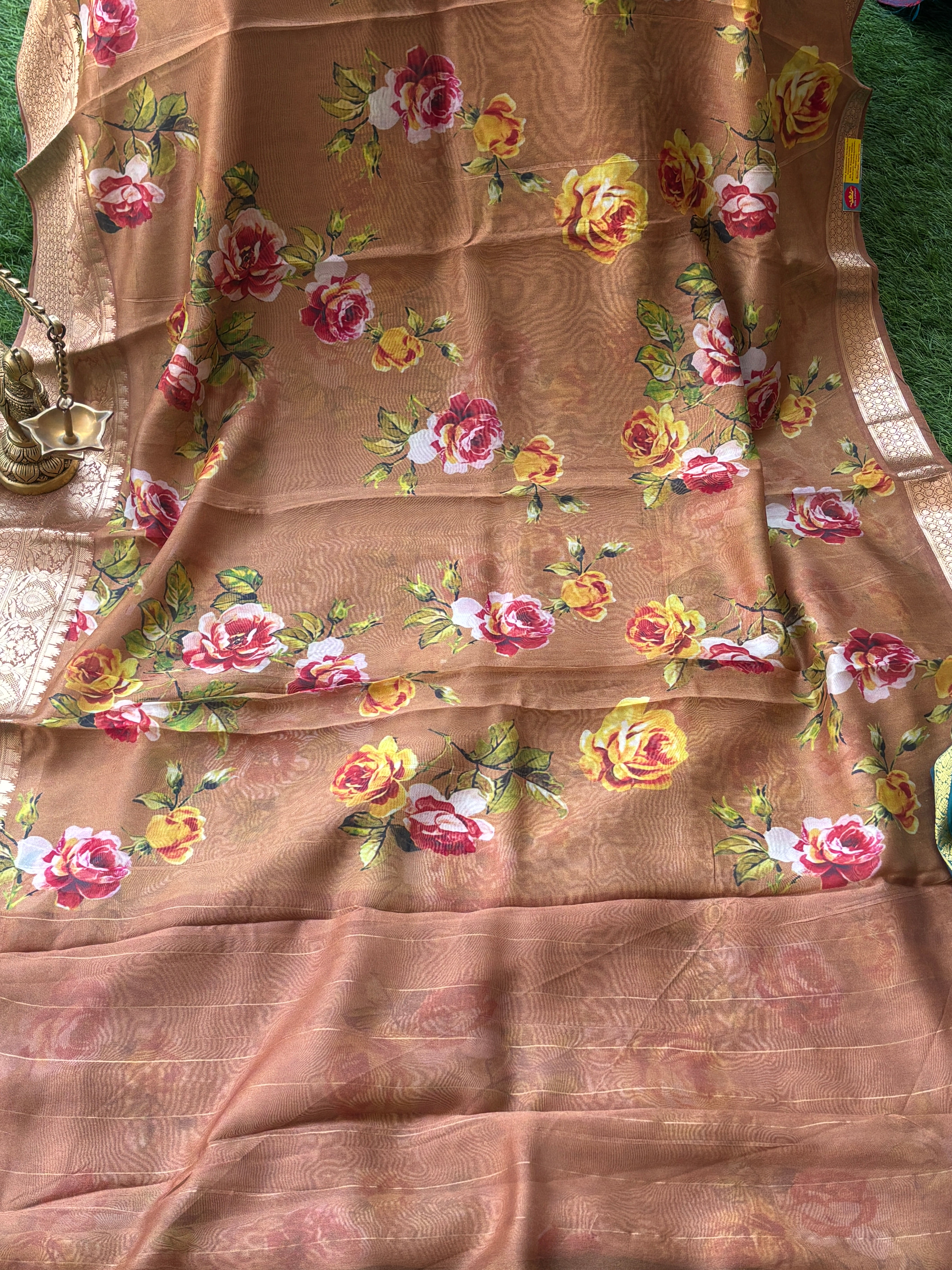 Elegant Brown Georgette Saree with Zari Woven Border