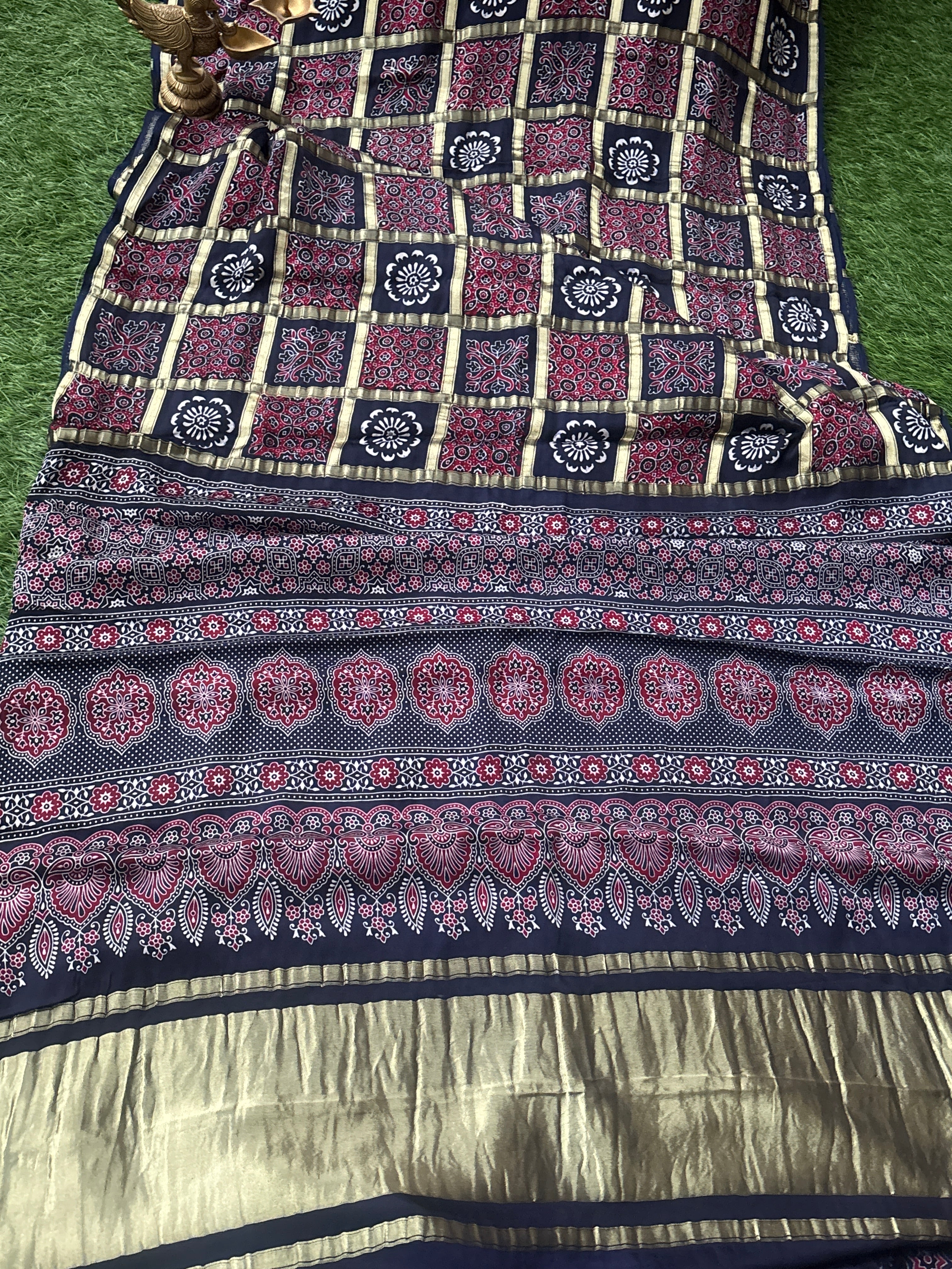 Rich zari woven pallu of royal blue gharchola saree