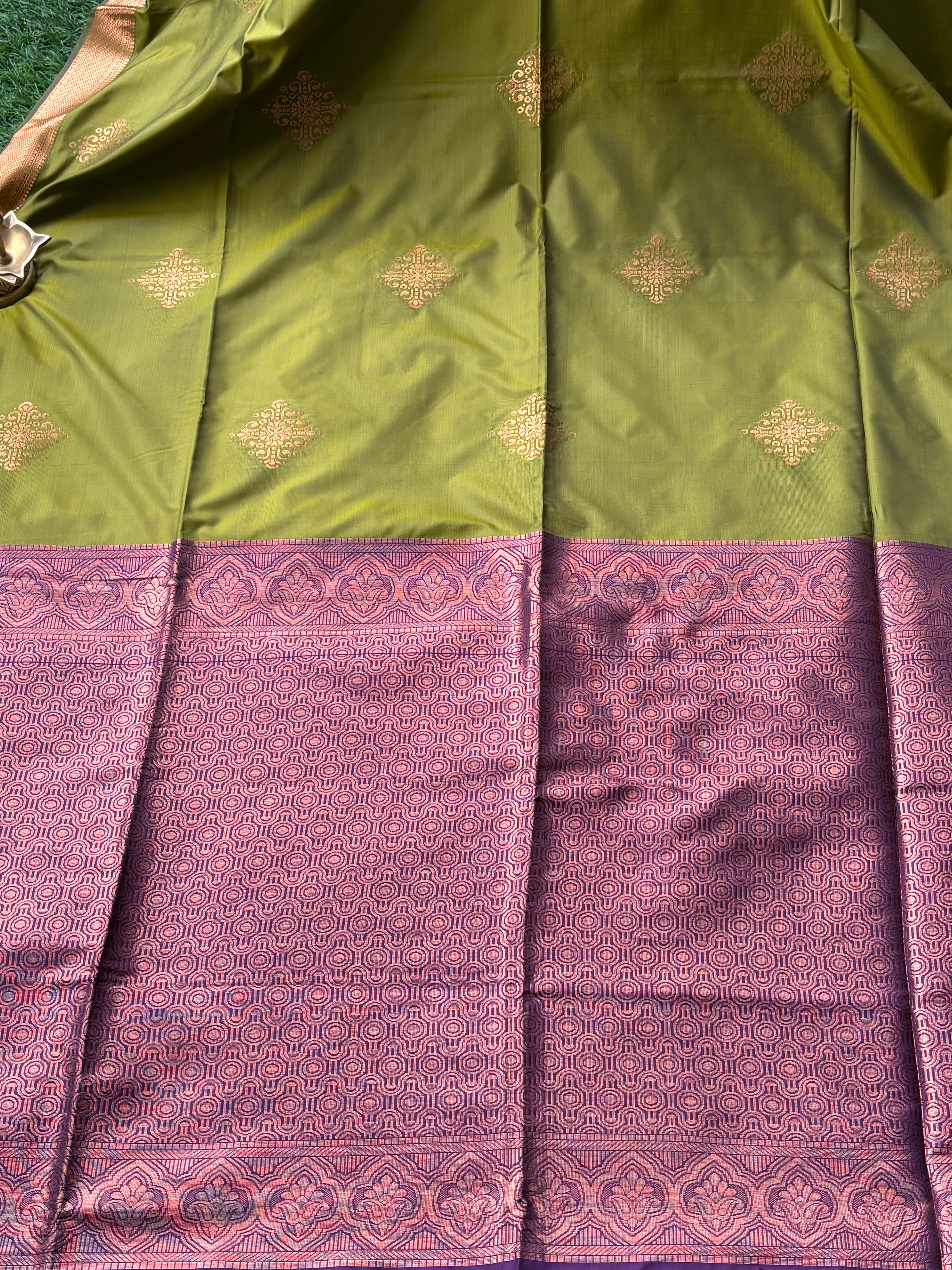 Royal Green Art Silk Kanjeevaram Saree with All-Over Zari Buttas & Purple Pallu