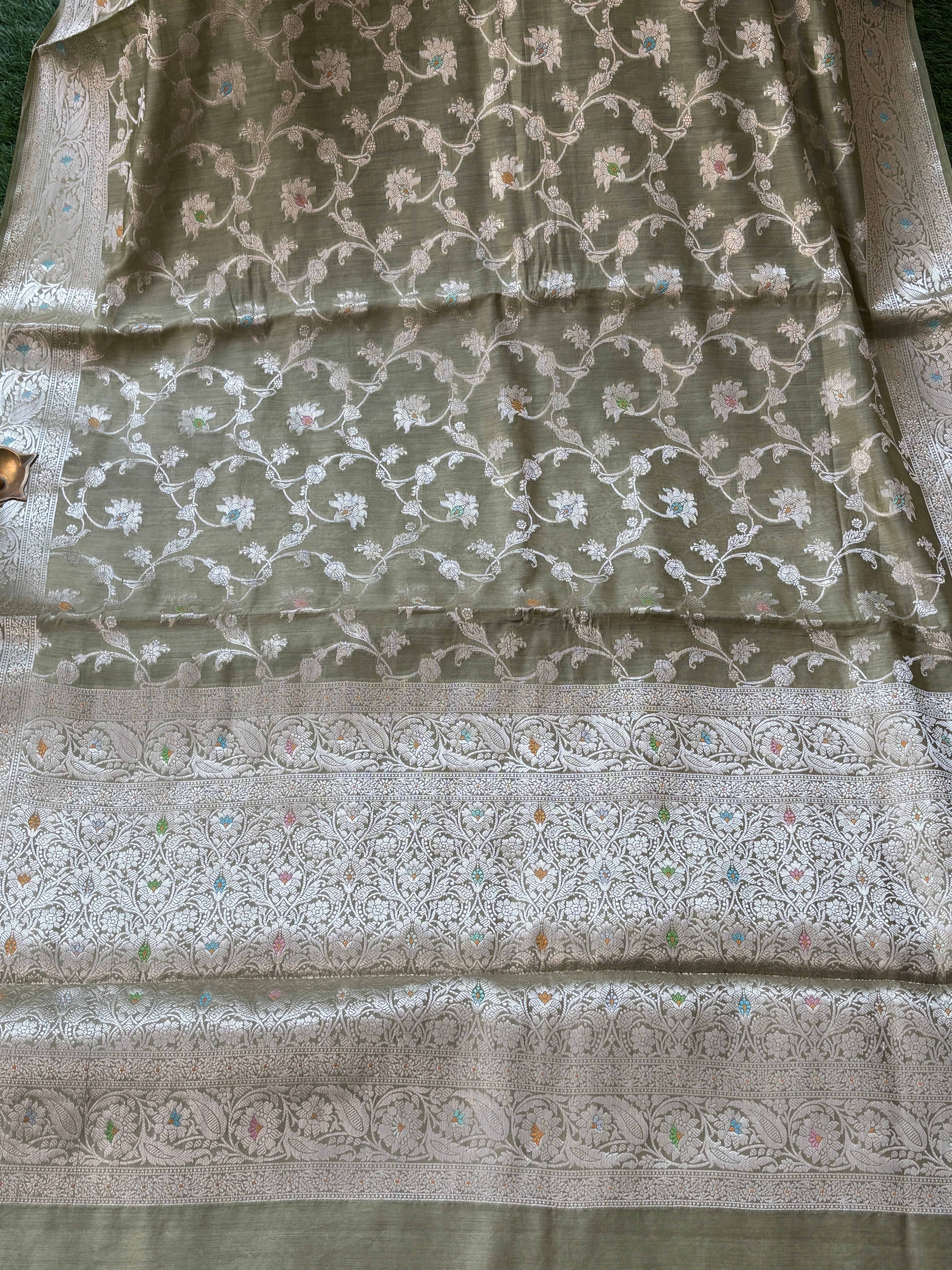Pastel Green Pure Banarasi Silk Saree with All-Over Weaving and Zari Border