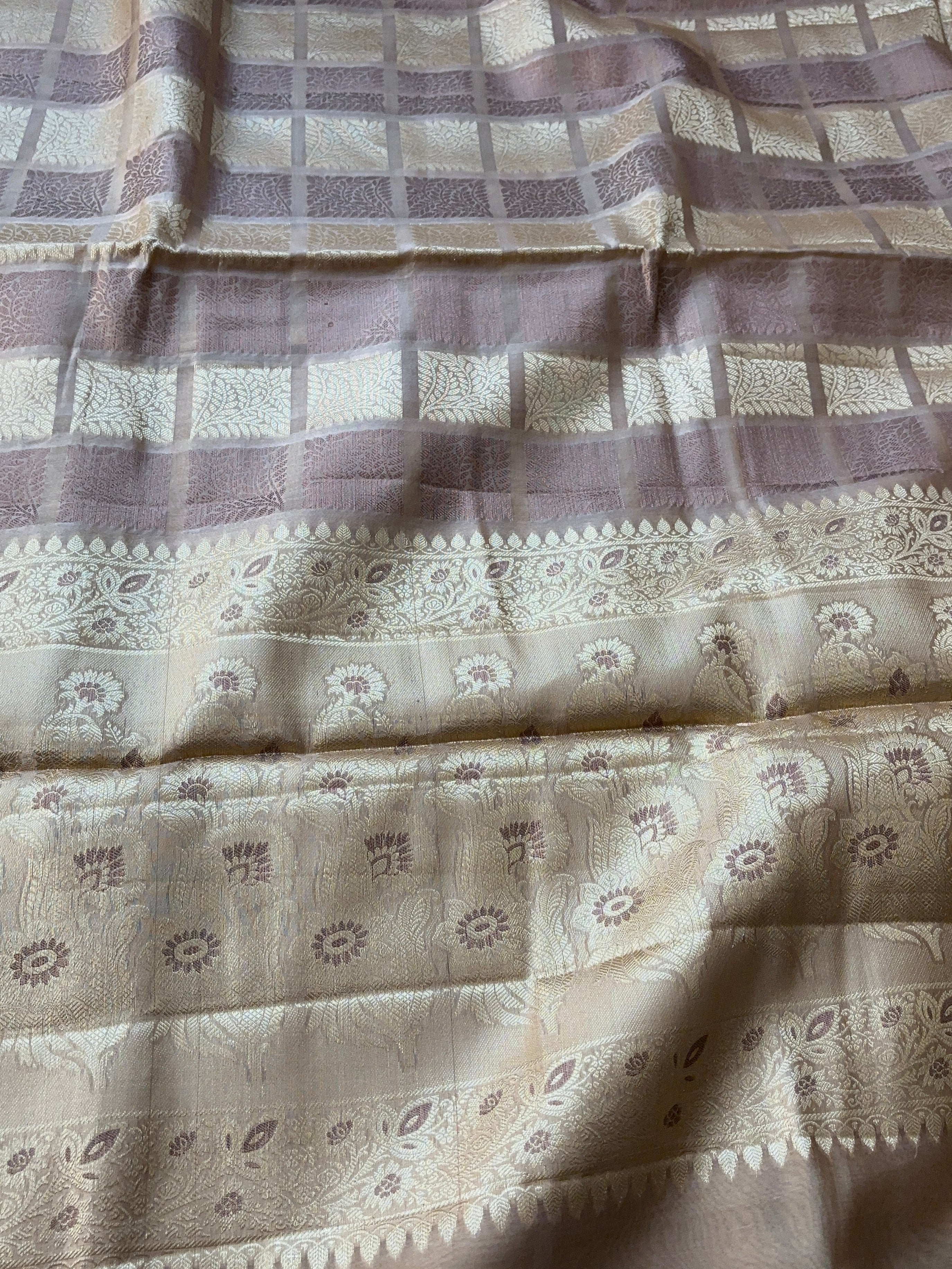 Rich brown pallu with detailed zari motifs on pure Banarasi saree