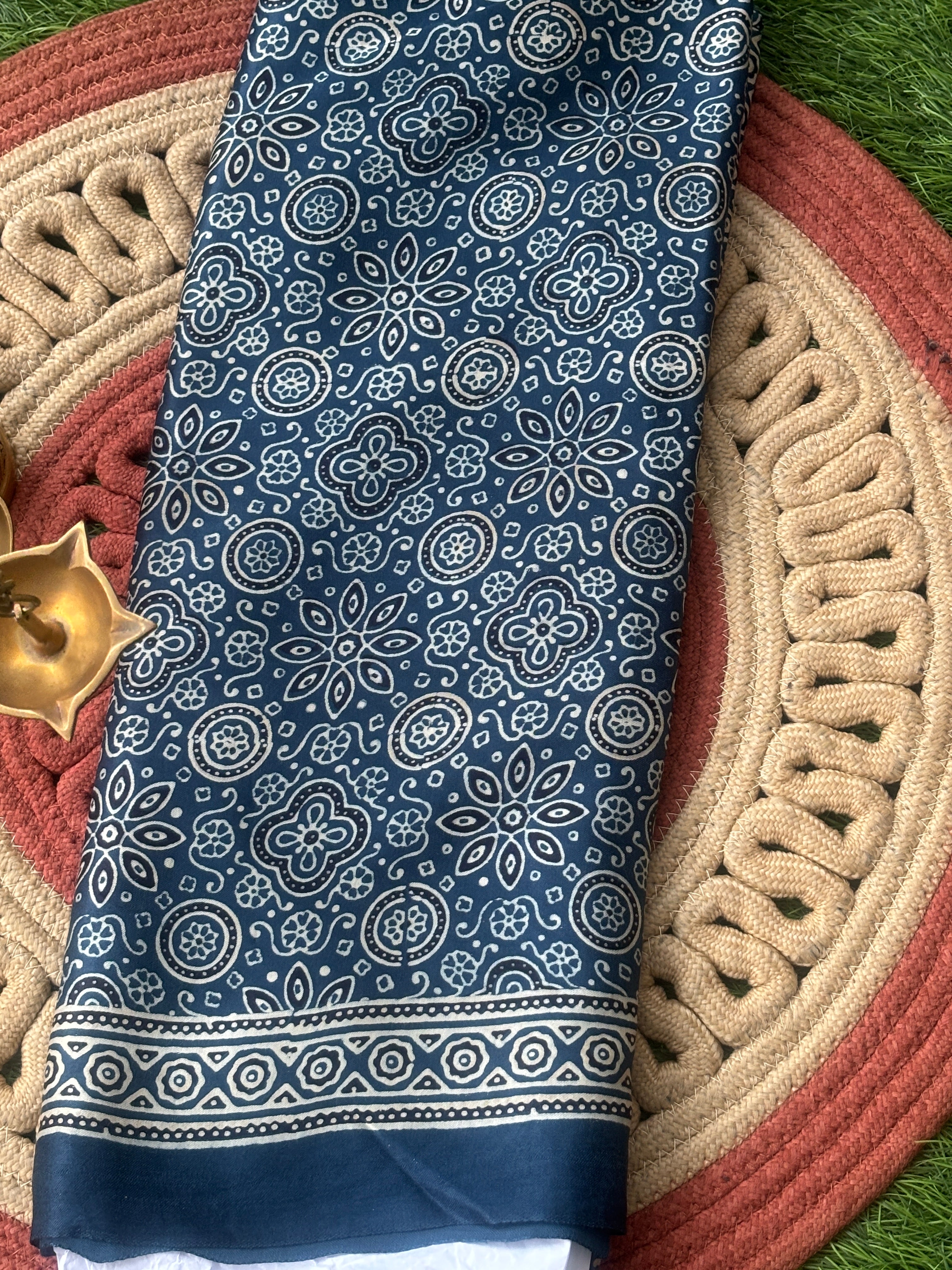 Navy blue pure modal silk gharchola saree with golden floral buttis and zari woven pallu