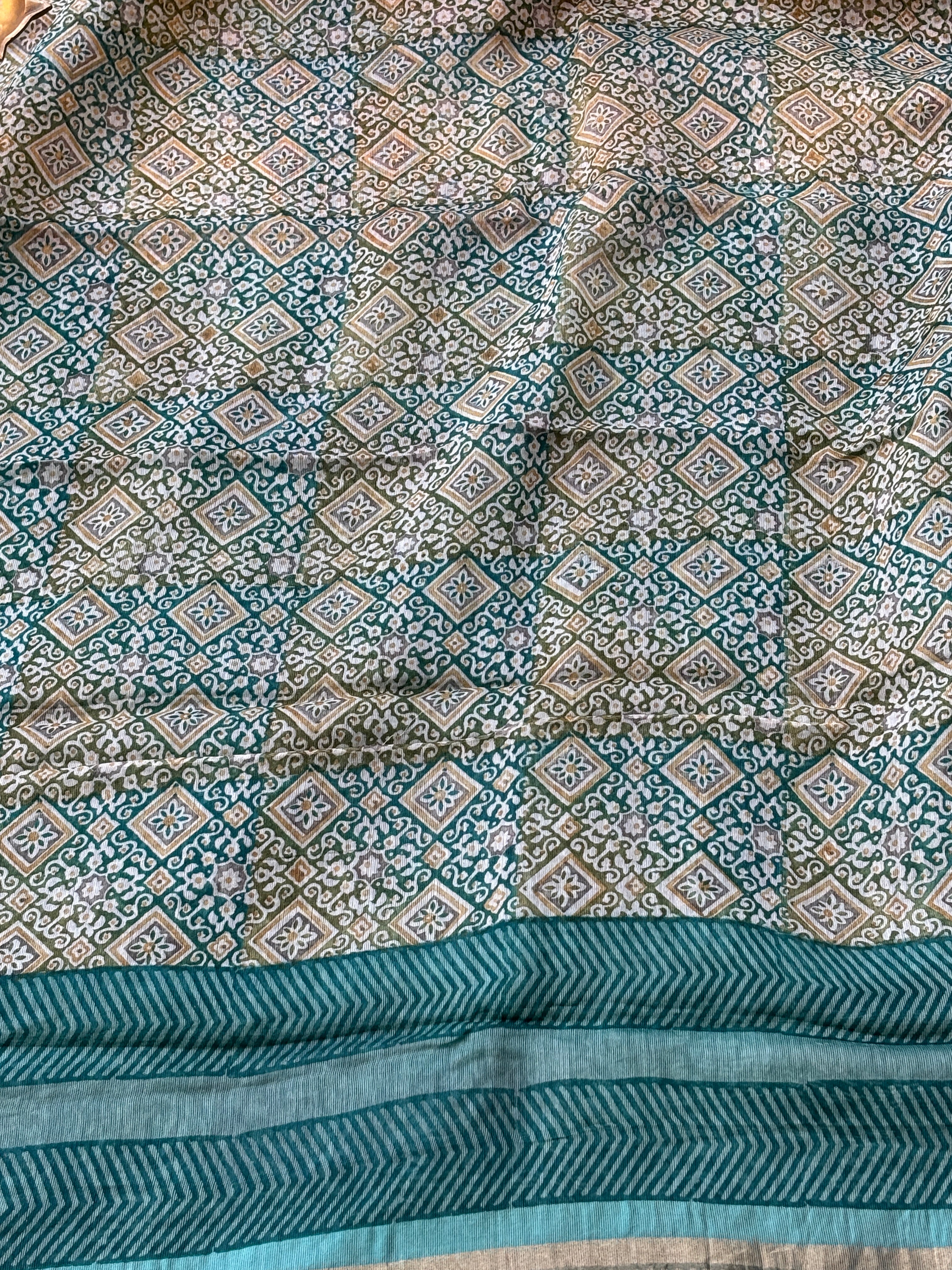 Close-up of Zari Border on Sea Blue Maheshwari Silk Saree