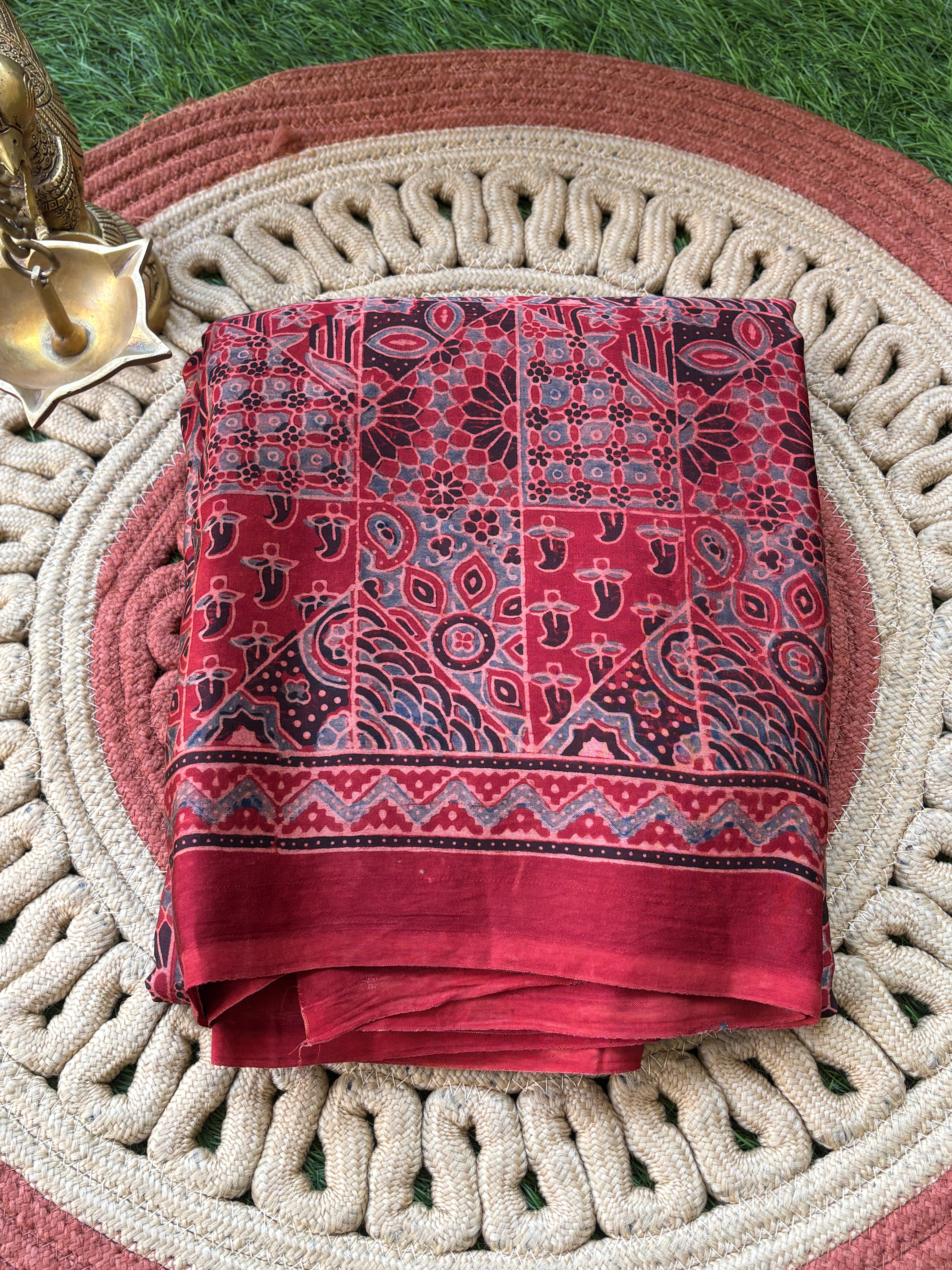 Red Pure Modal Silk Ajrak Digital Printed Saree by Chandrika Lifestyles with traditional motifs and elegant zari lugdi patta pallu
