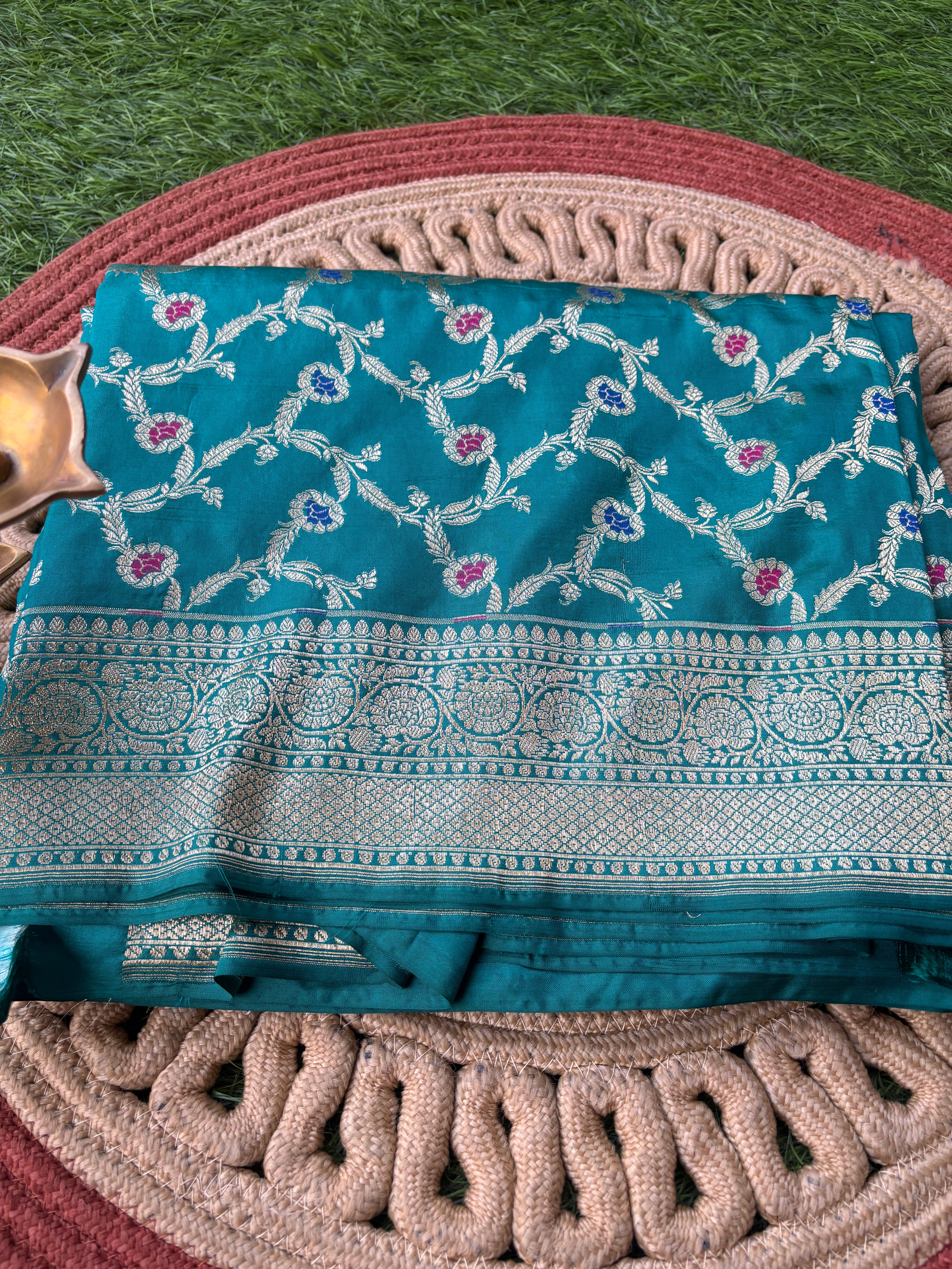 Pure silk banarasi peacock green all over jaal weaved saree
