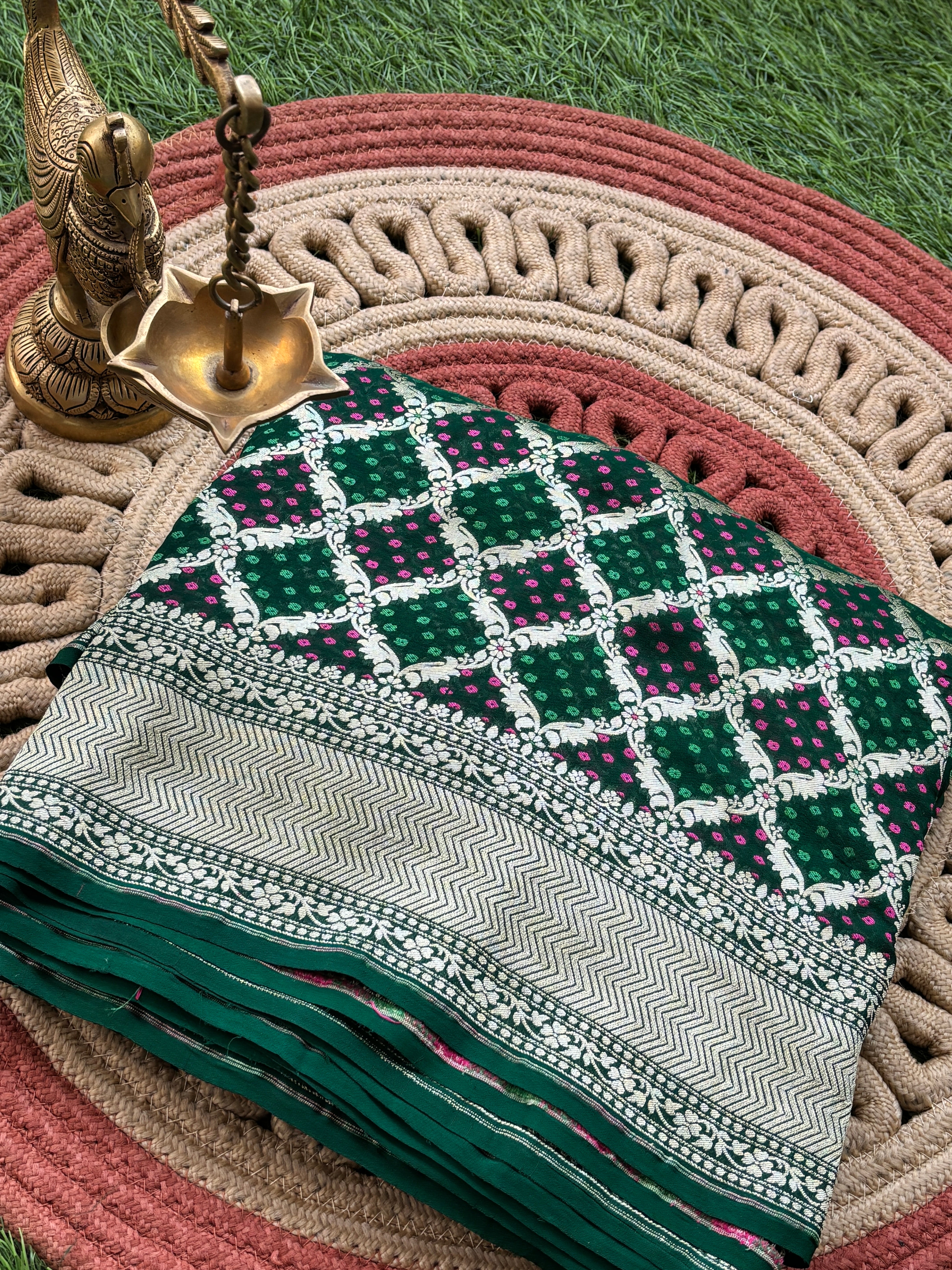Green pure khaddi georgette Banarasi saree with batik weaving and allover jaal pattern by Chandrika Lifestyles