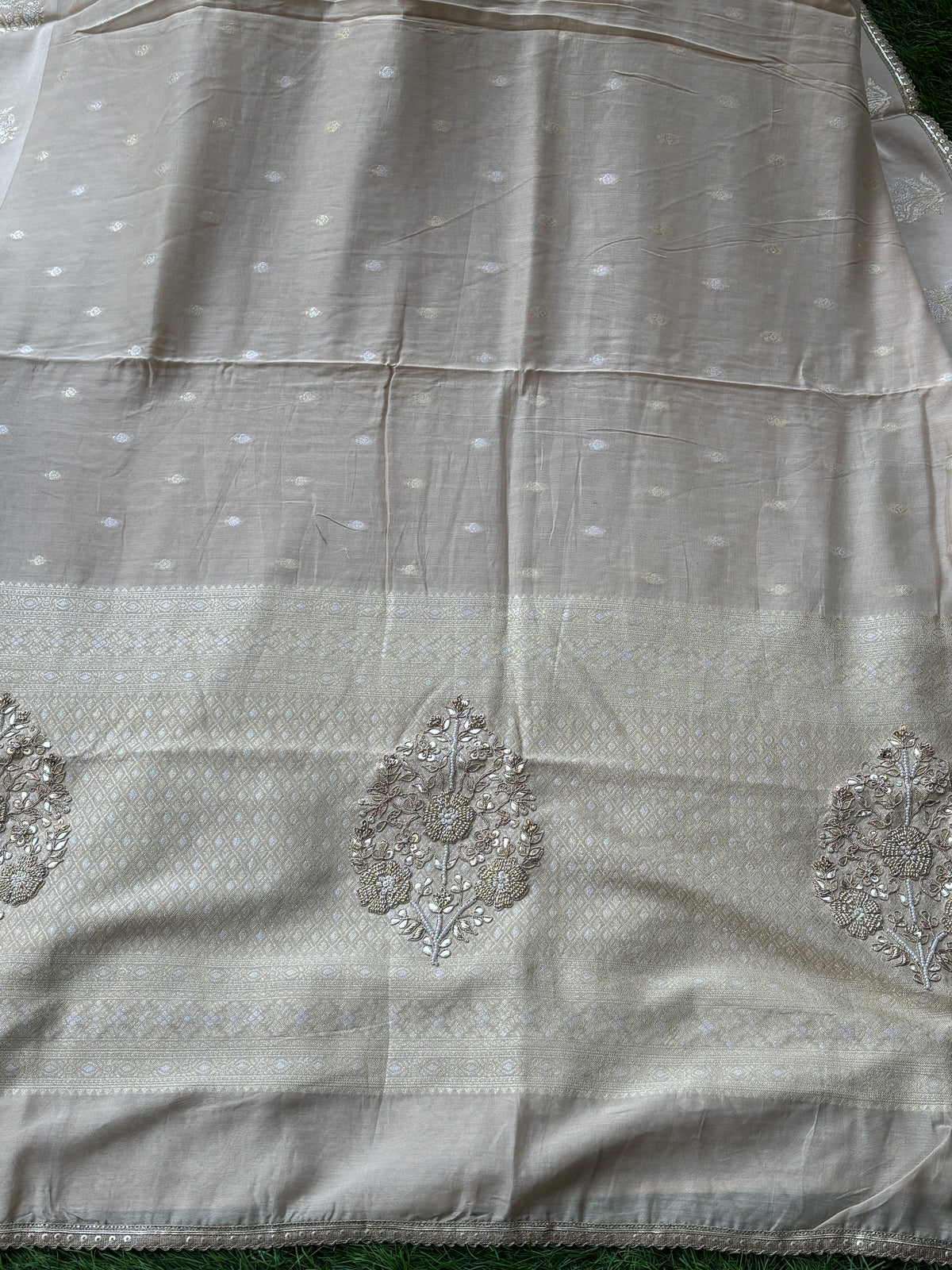 Banarasi  weaving offwhite sari with embroidery Zardozi Buta on Pallu all over weaving on the sari and with ready-made blouse