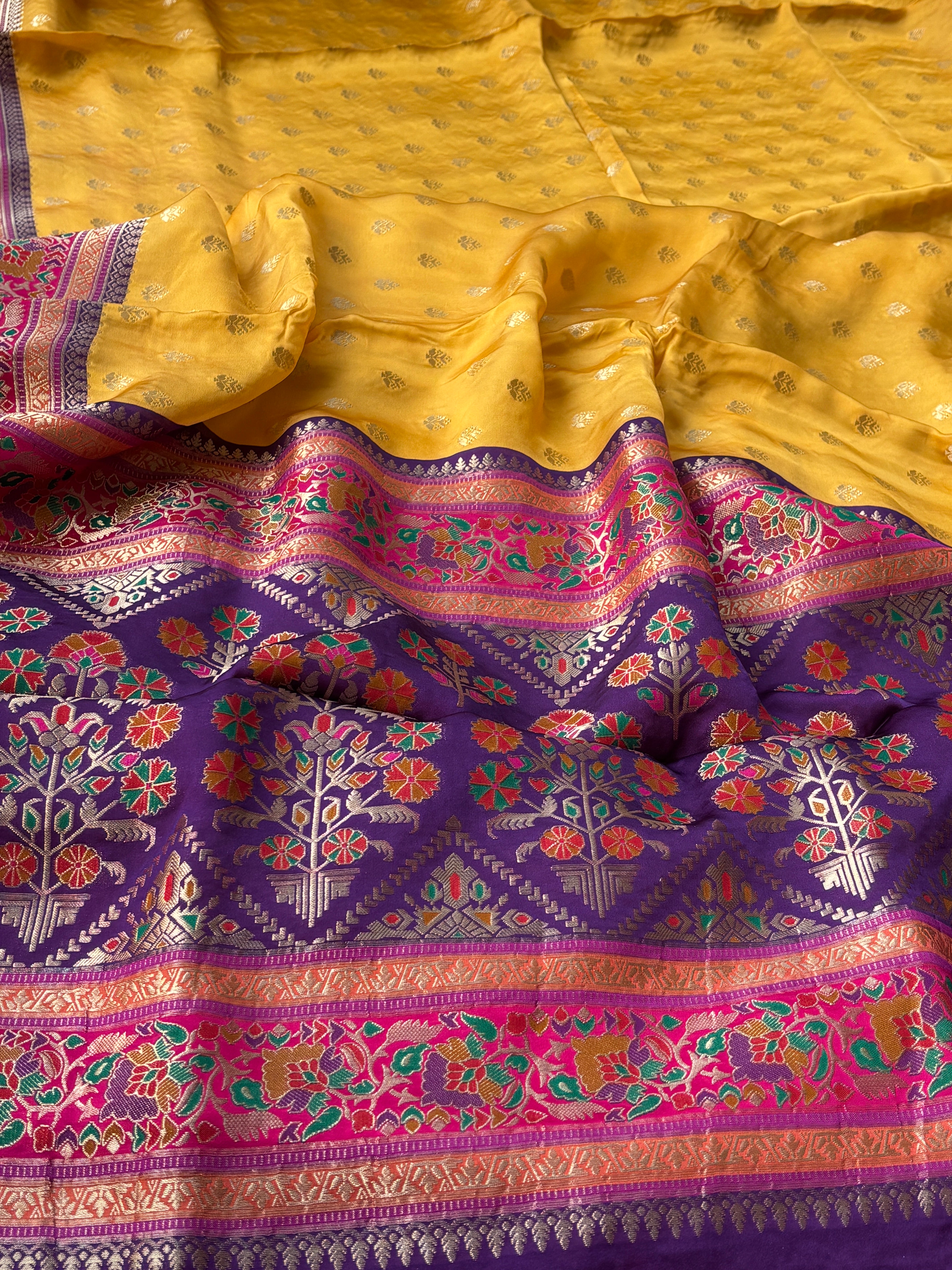 Smooth glossy texture of pure Mashru silk with traditional Banarasi weave pattern