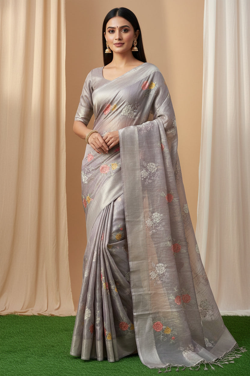 Model wearing pastel purple tissue Kora organza saree with floral embroidery and crocheted border