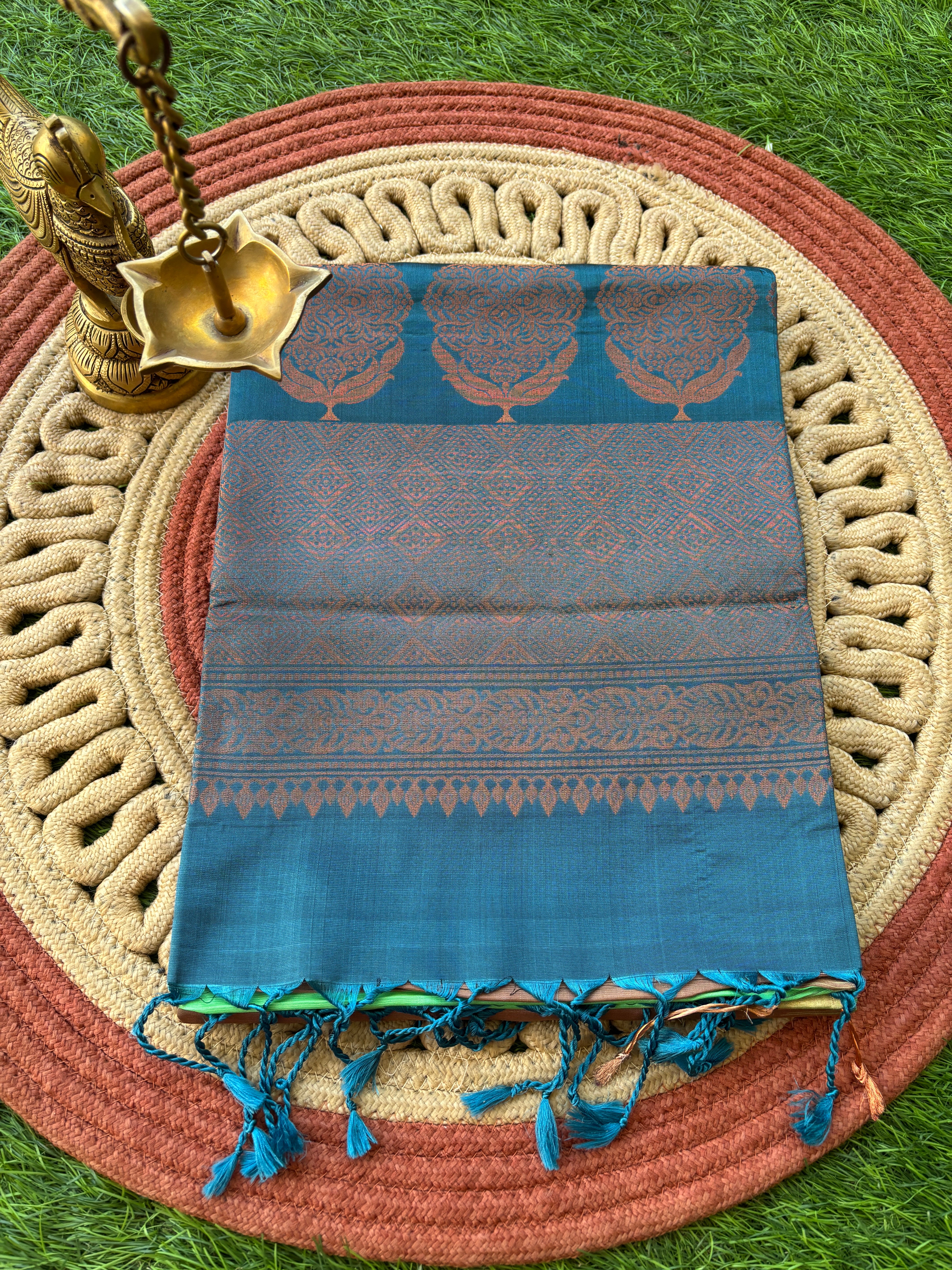 Pastel Green and Pastel Brown Half and Half Kanchipuram Silk Saree with Small Zari Border