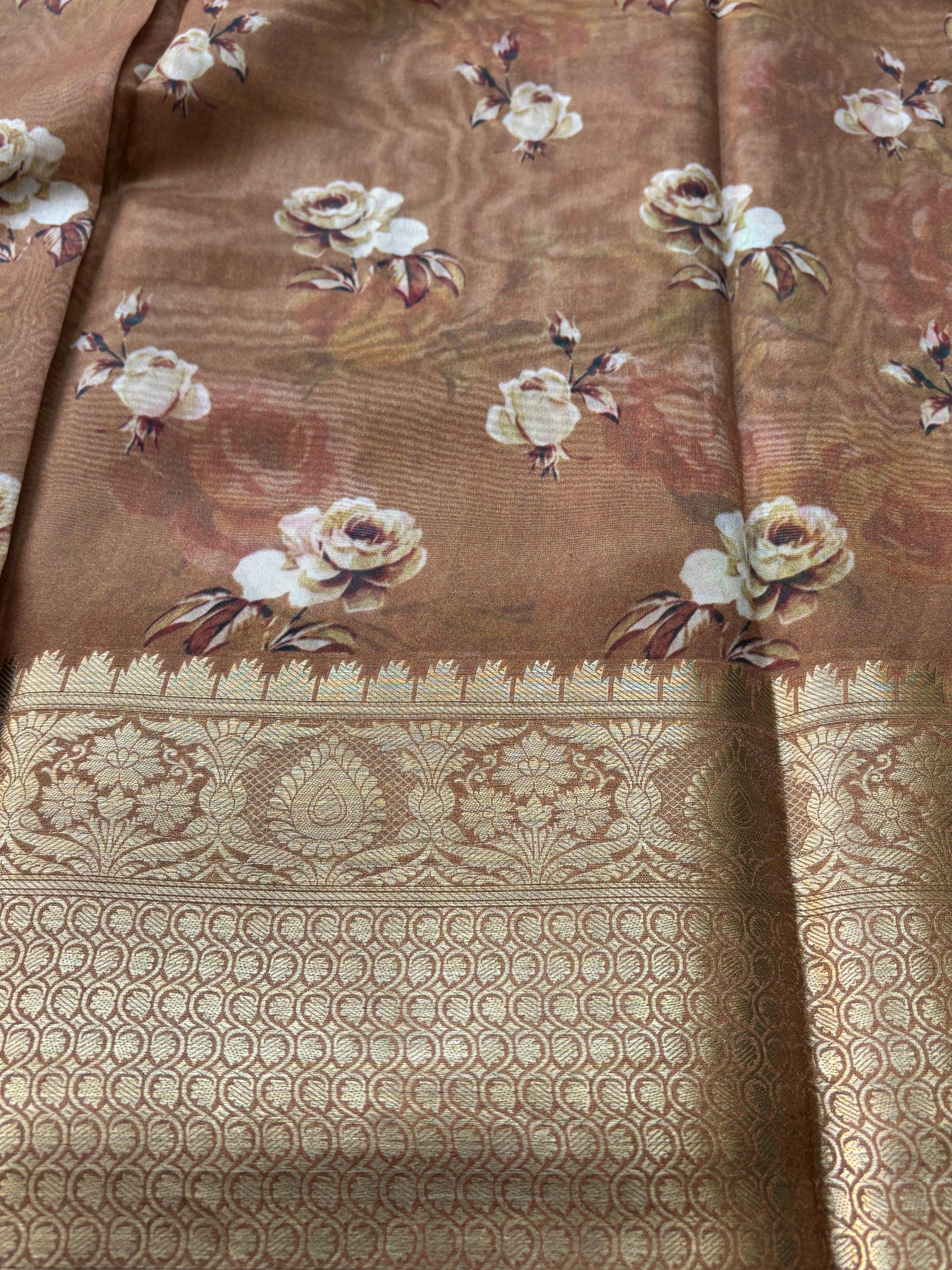 Elegant Brown Georgette Saree with Zari Woven Border
