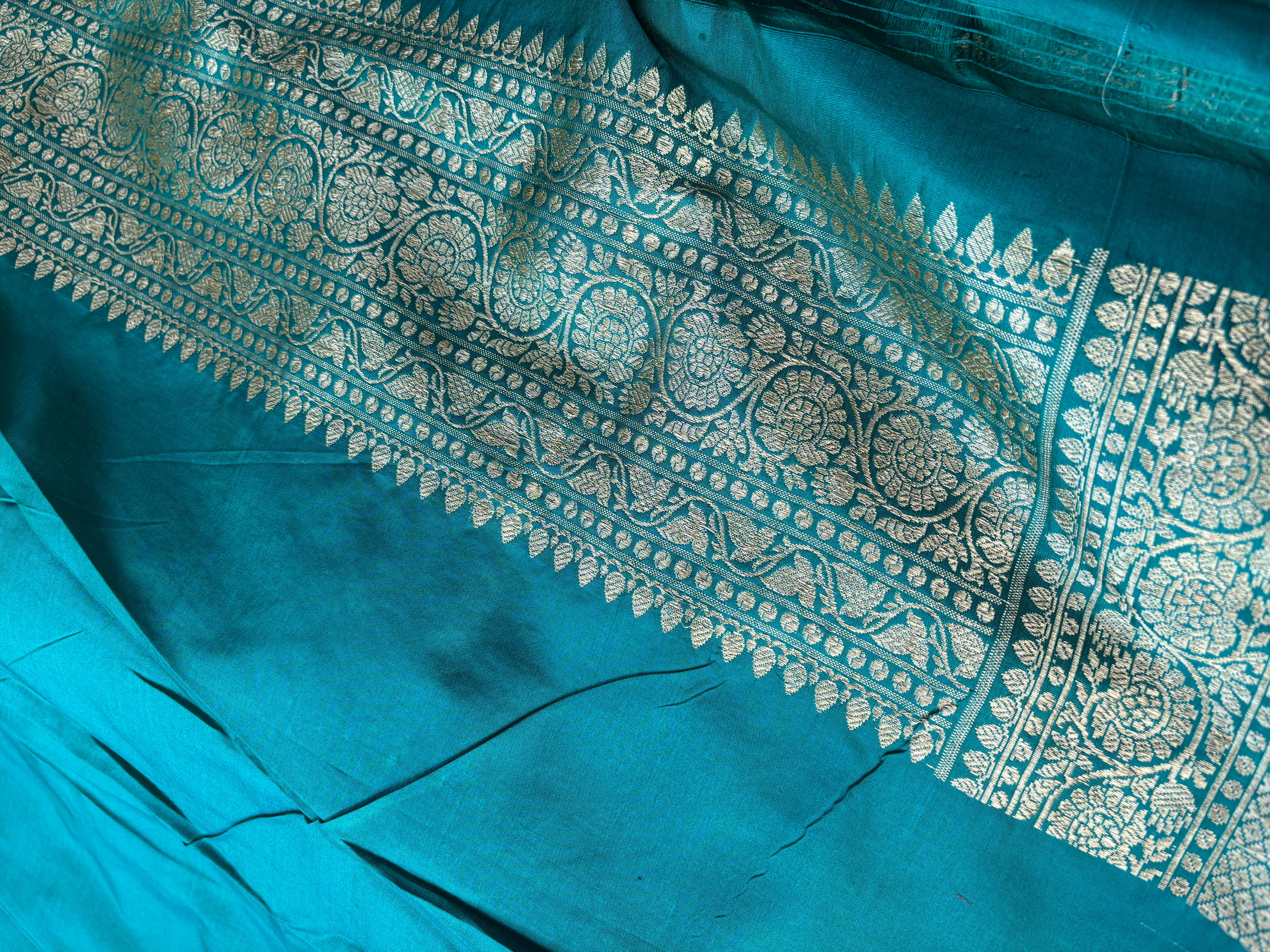 Pure silk banarasi peacock green all over jaal weaved saree