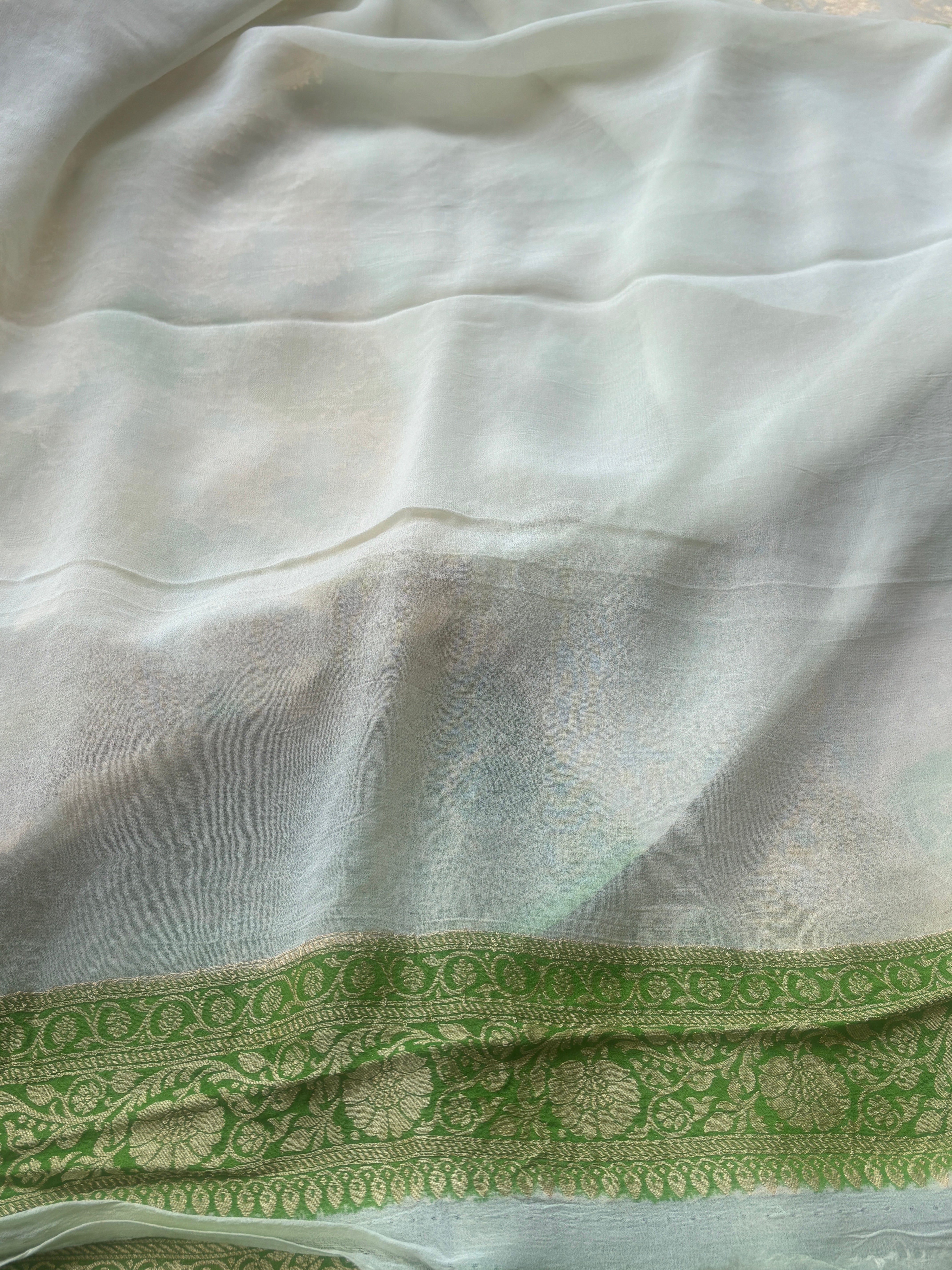 Running blouse piece with zari border in pastel Khaddi Georgette Banarasi saree