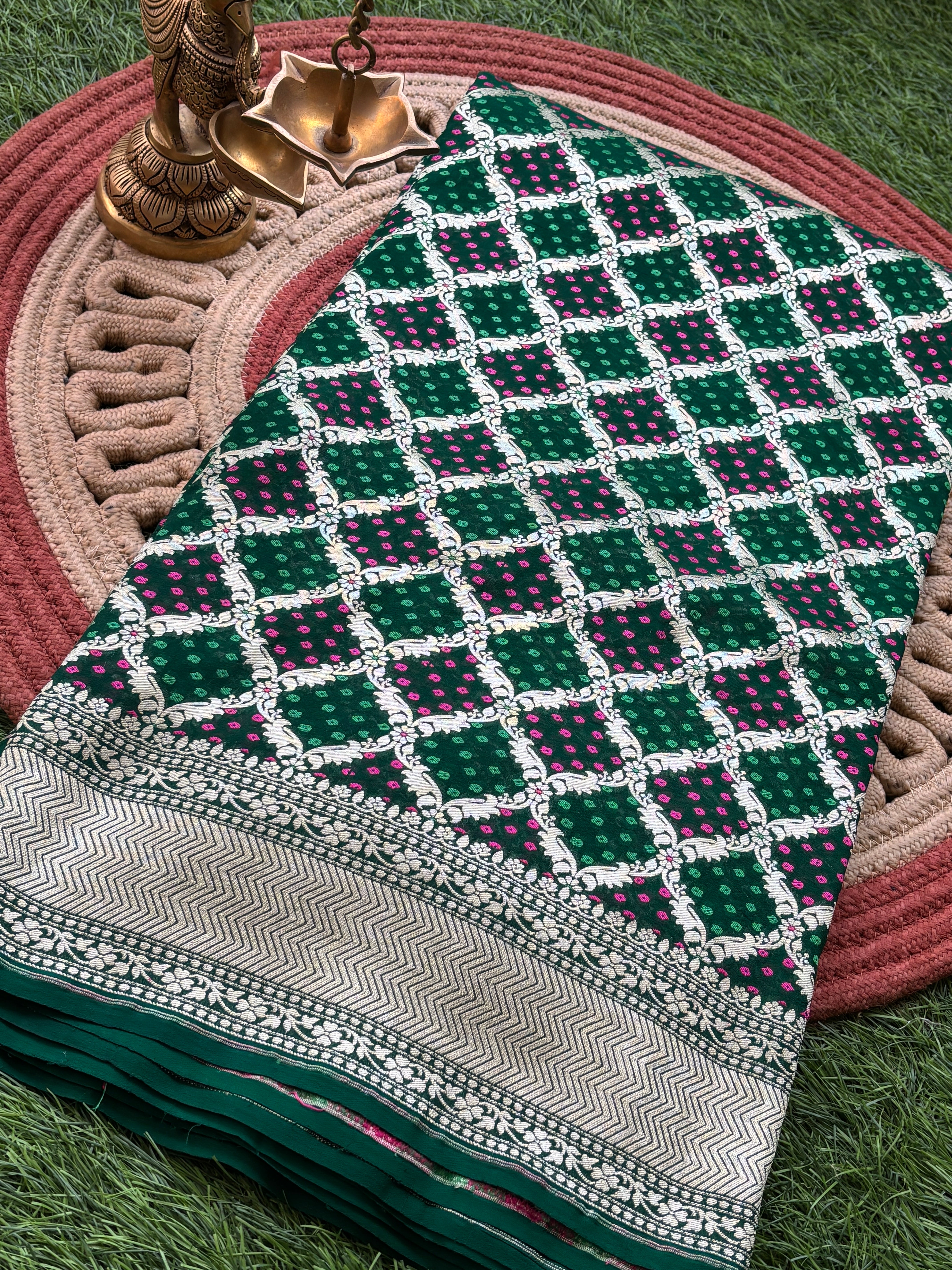 Green pure khaddi georgette Banarasi saree with batik weaving and allover jaal pattern by Chandrika Lifestyles