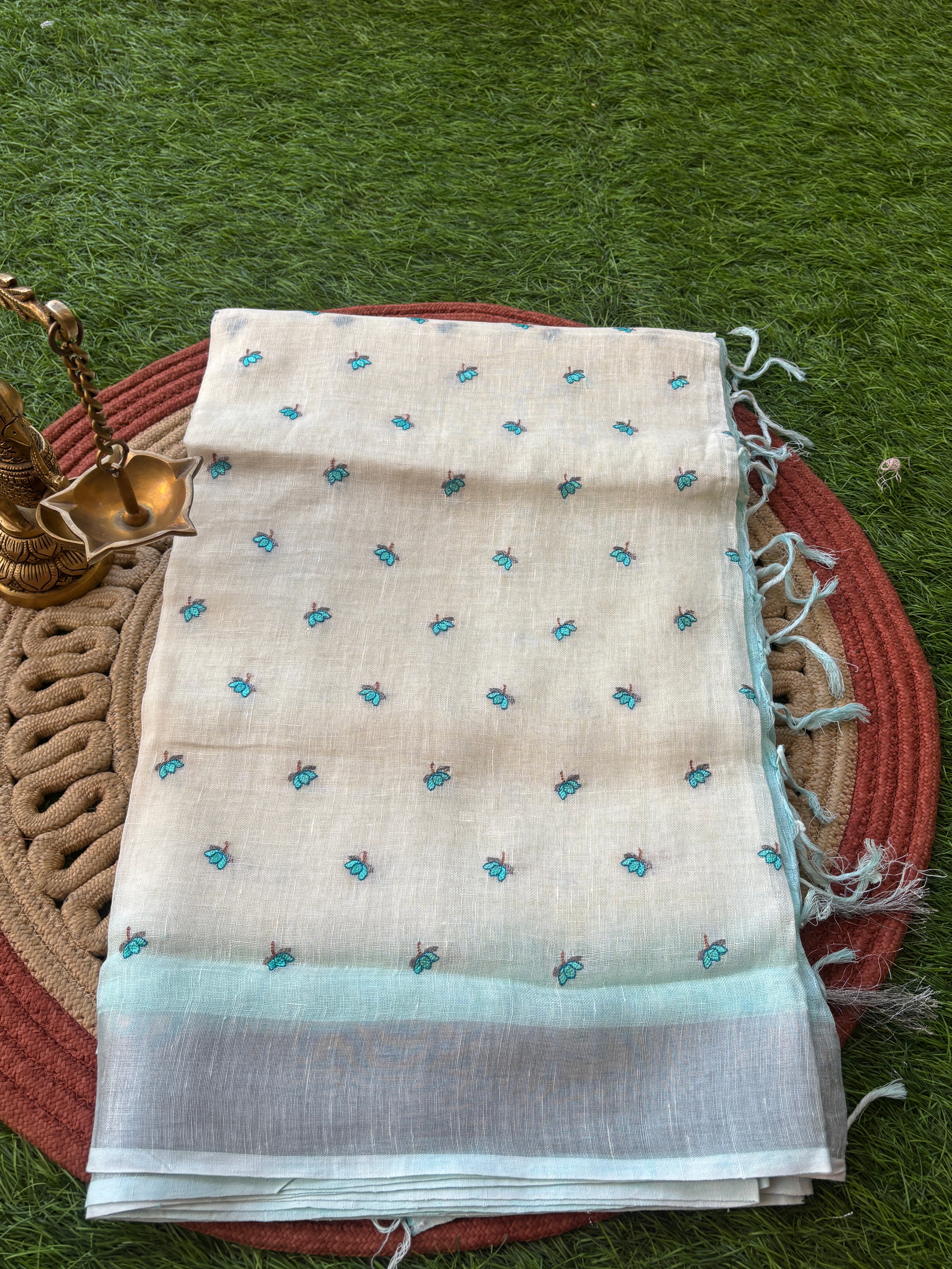 White & Blue Pure Linen Saree with Allover Embroidered Butti | Chandrika Lifestyles