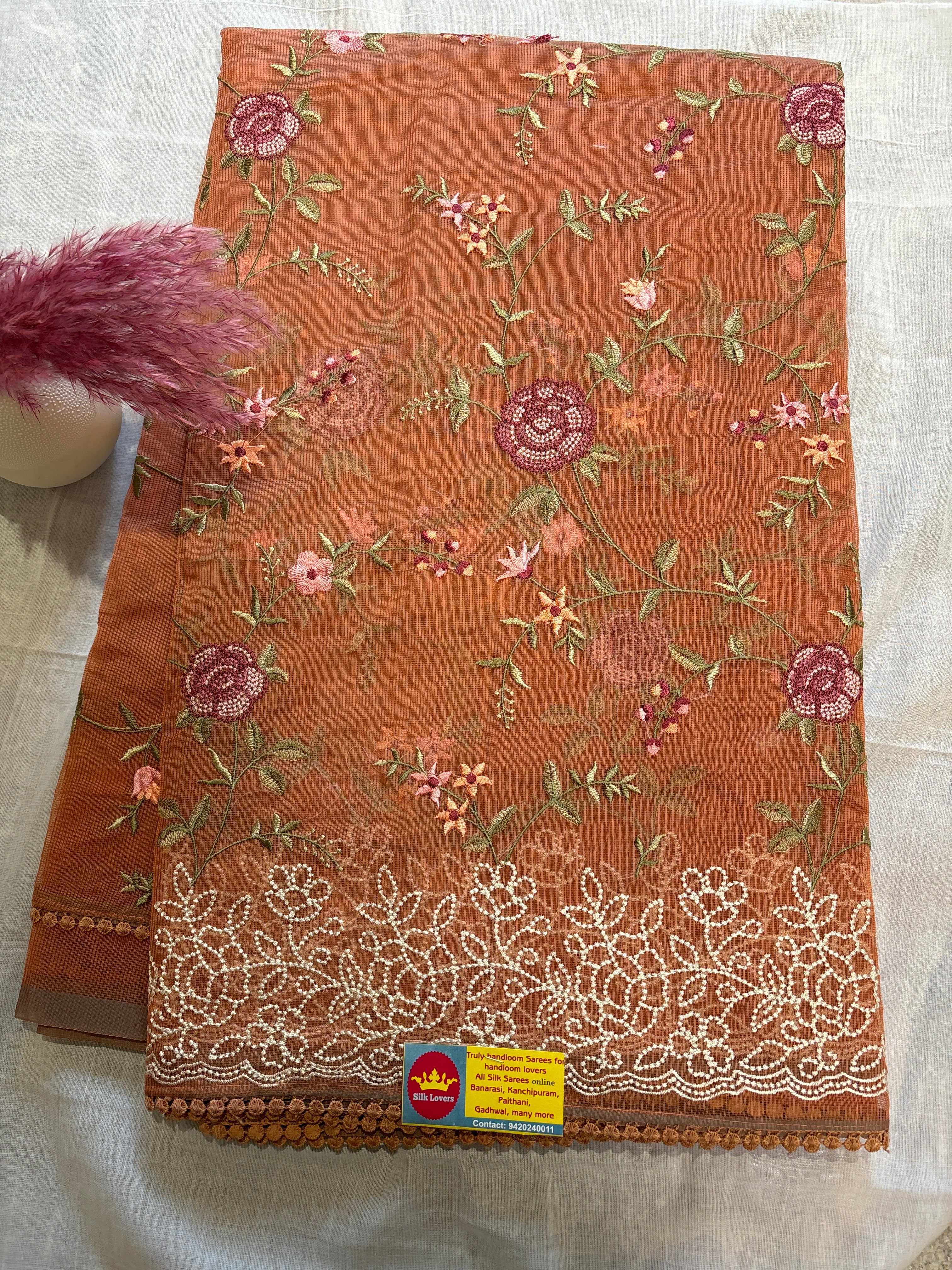 Floral embroidered rust Supernet saree