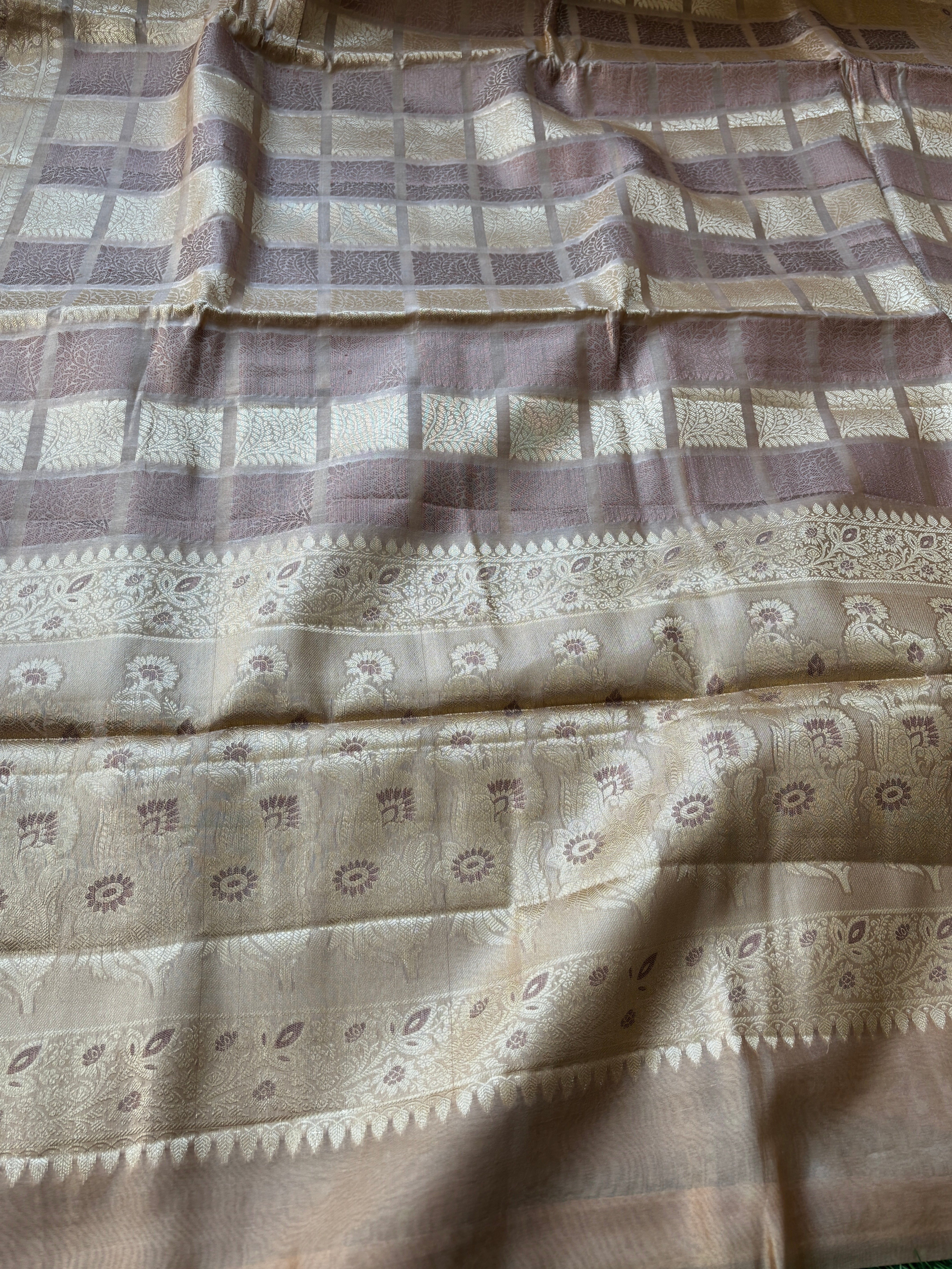Smooth luxurious texture of pure Banarasi silk in beige shade