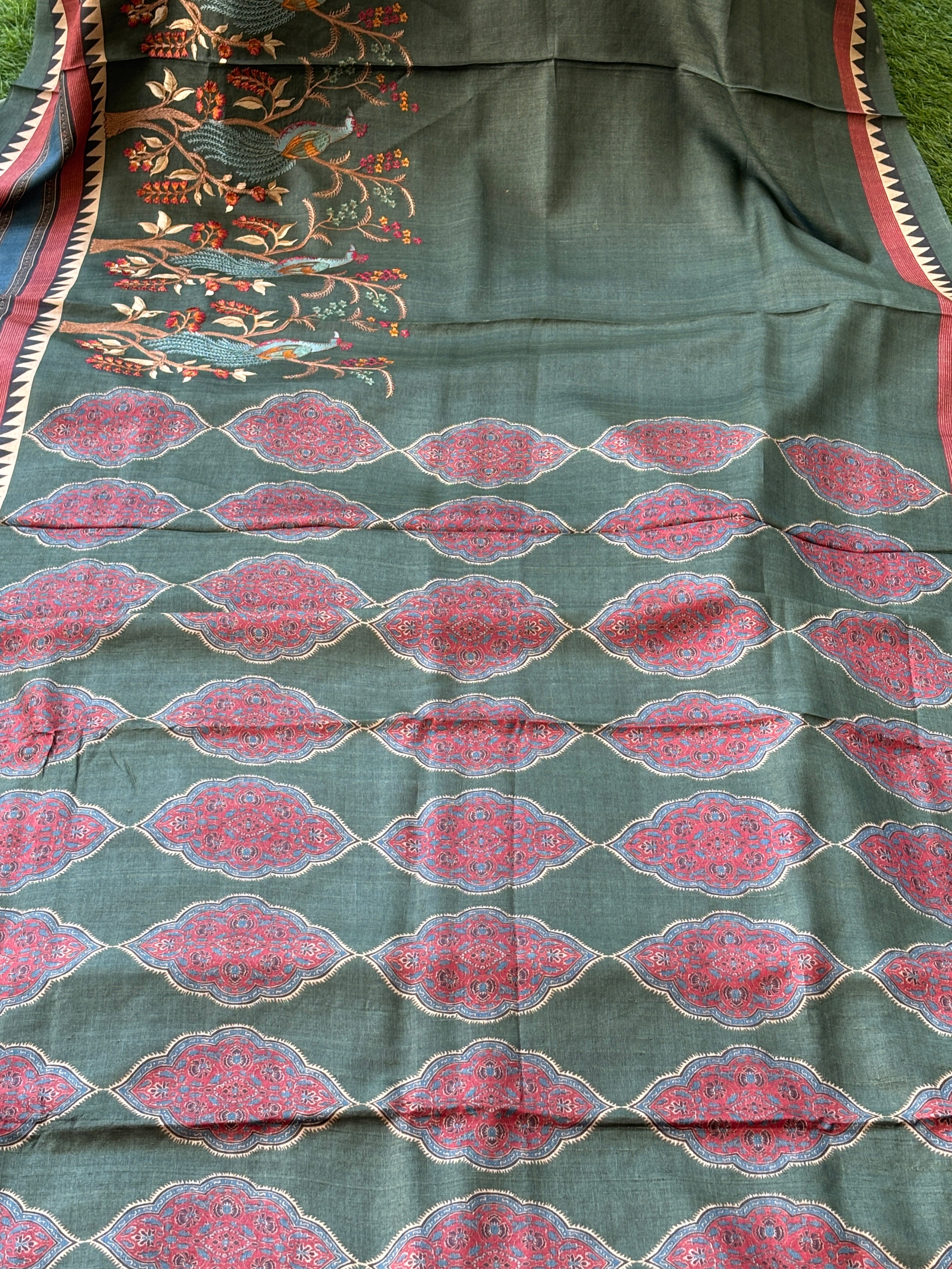 Thread Embroidery Detail in Pleats of Dark Leaf Green Digital Print Saree
