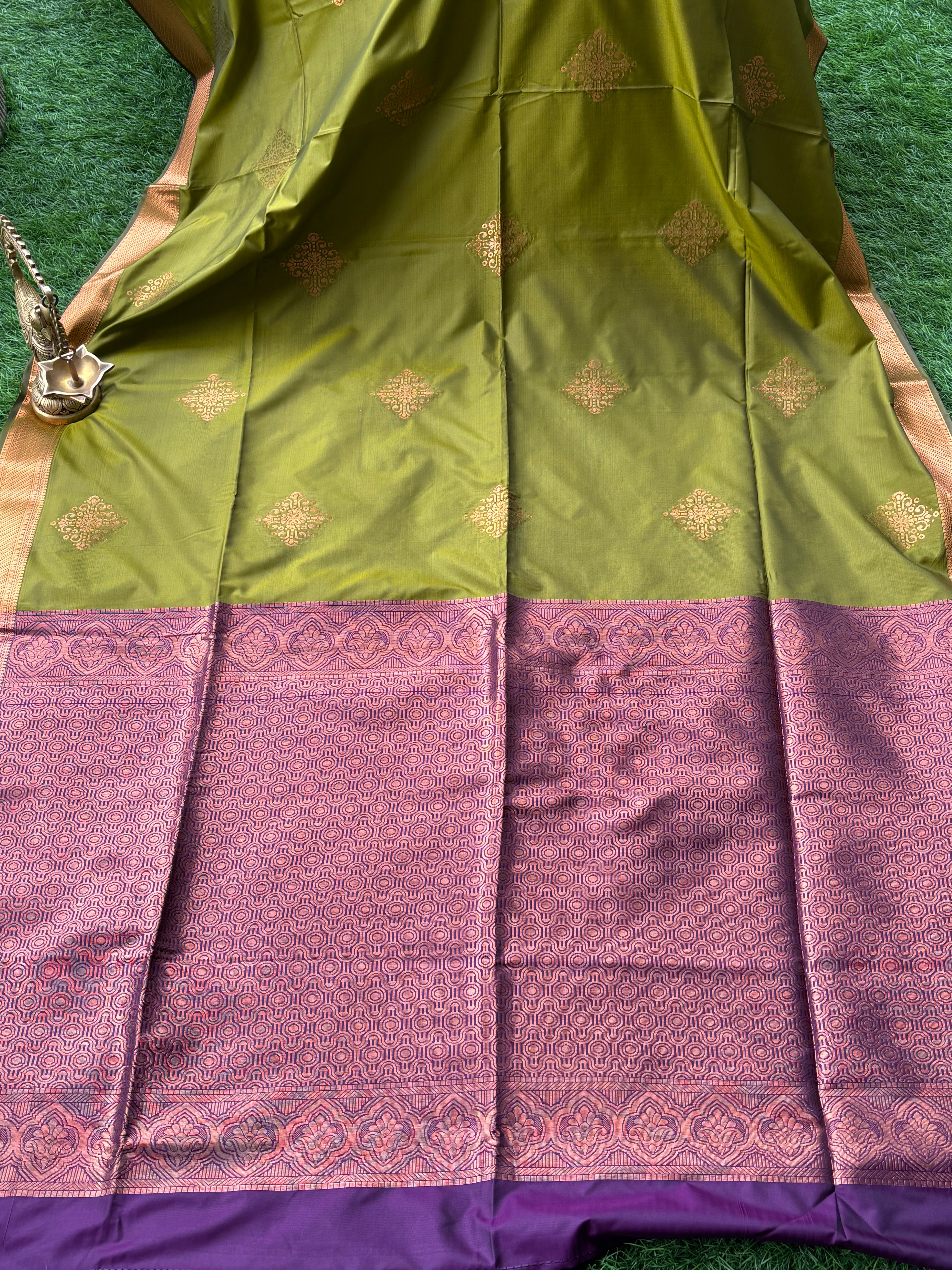 Royal Green Art Silk Kanjeevaram Saree with All-Over Zari Buttas & Purple Pallu