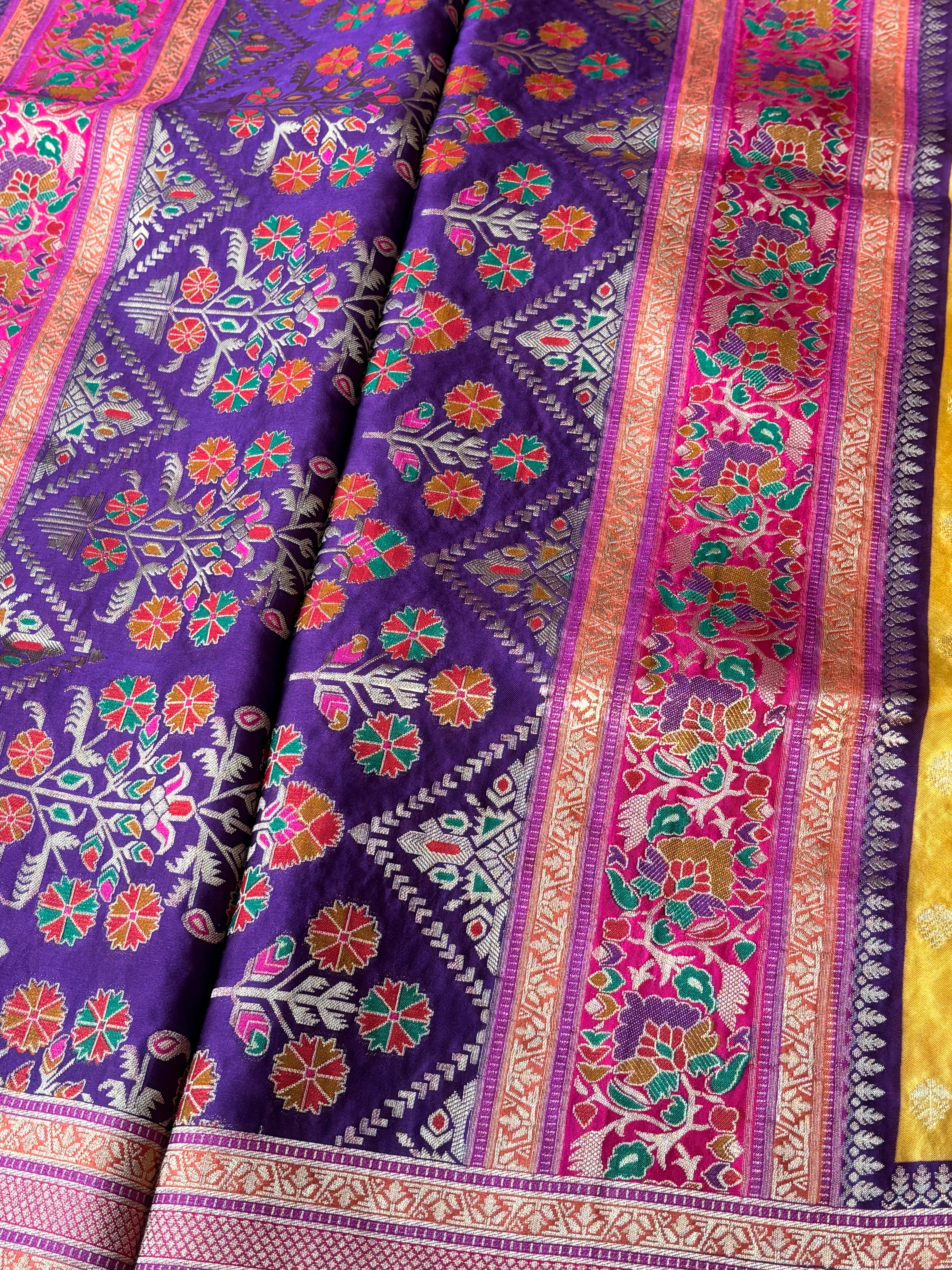 Dark purple Banarasi pallu with rich gold zari weaving detail